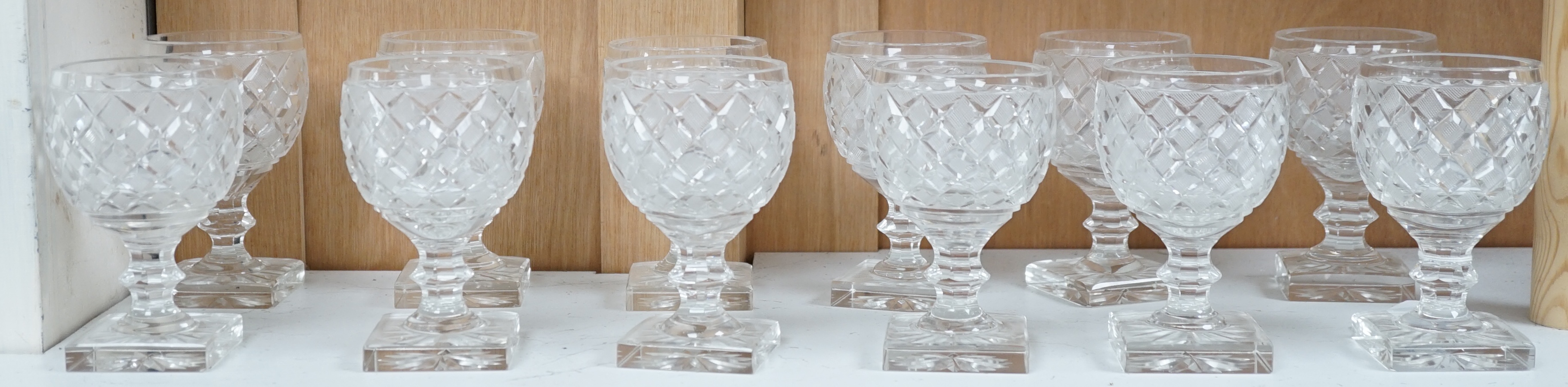 A set of twelve Voneche glass square based wine glasses, 13.5cm high. Condition - fair to good, some minor chips